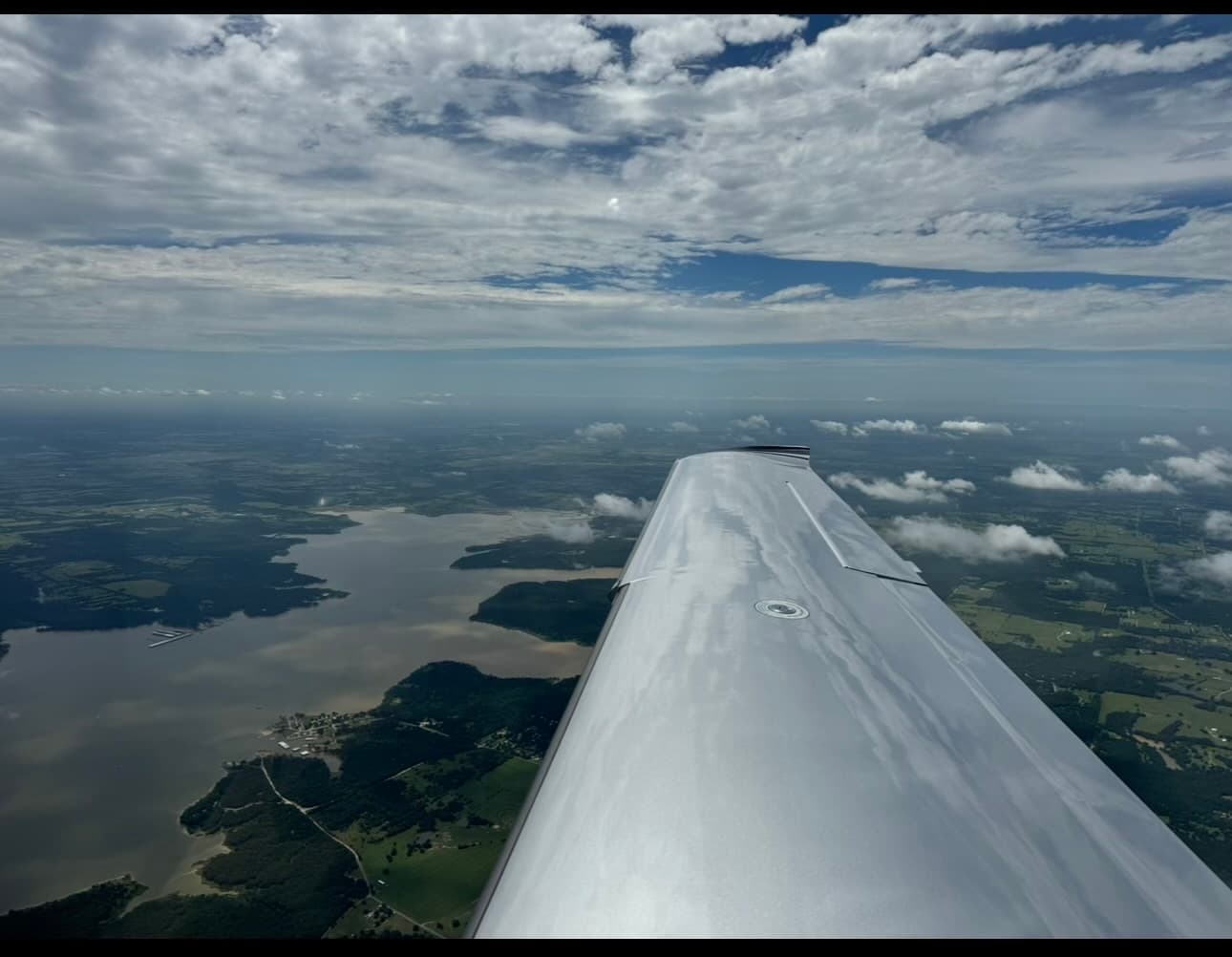 Aerial view of the lakes and landscape surrounding Hicks Airfield in Fort Worth, TX