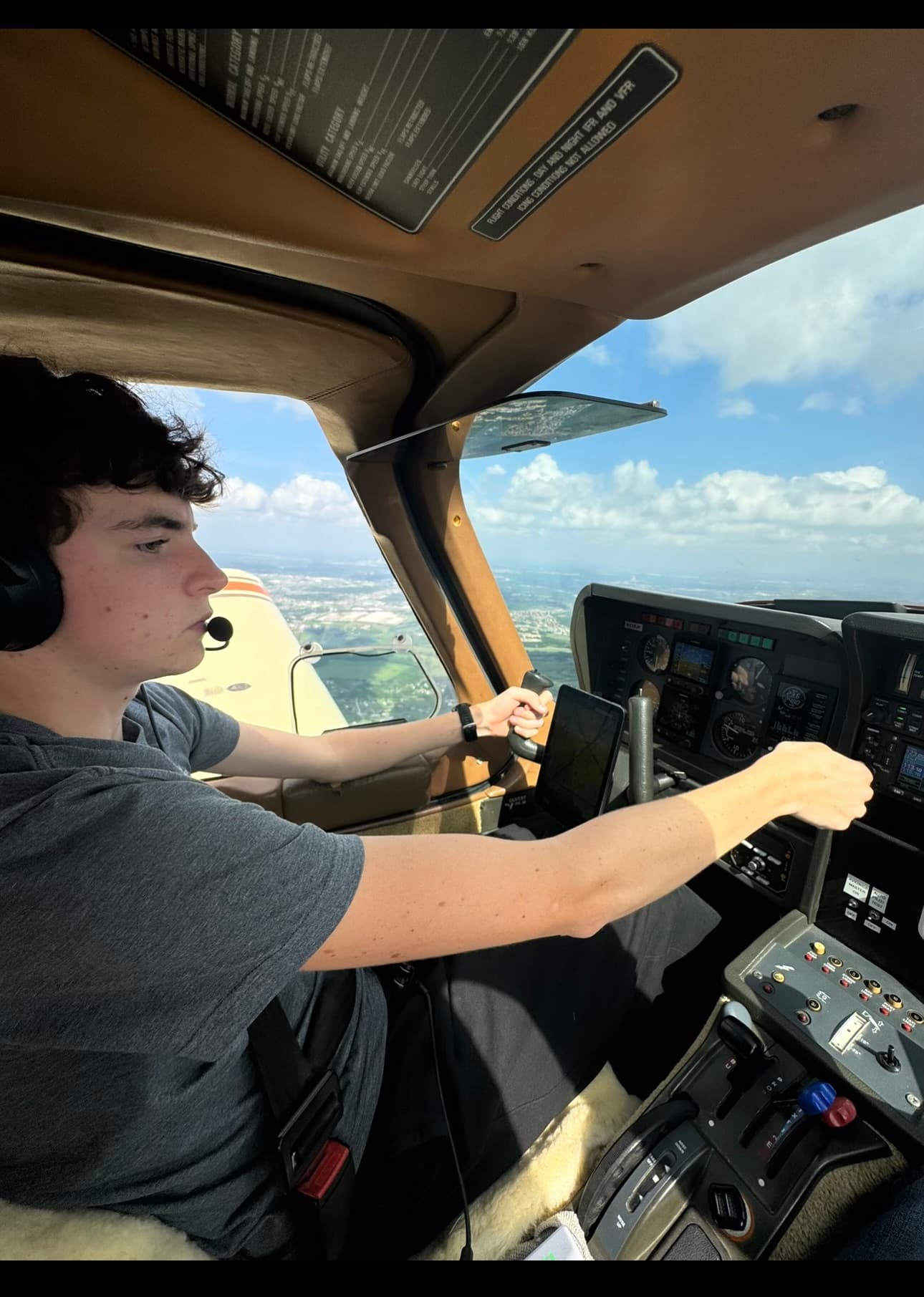 Student pilot at the controls of the TB10 during a flight lesson